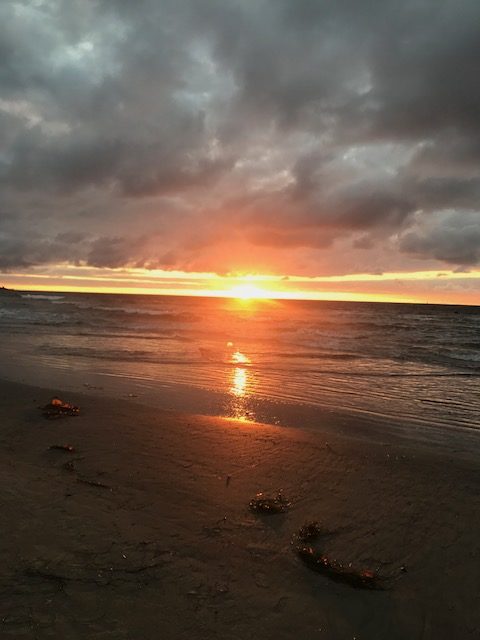 Dramatic storm light breaking over a moody La Jolla sunset